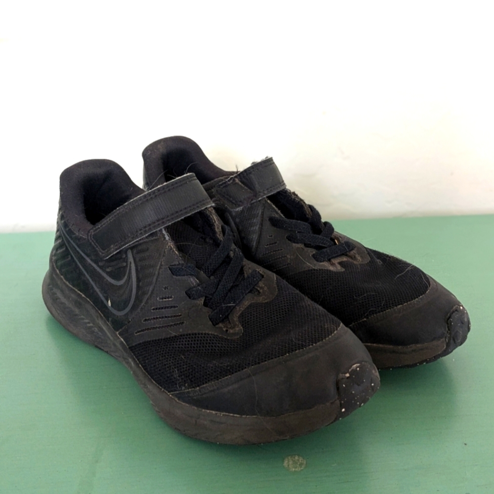 Nike sneakers solid black size 2